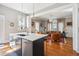 Open kitchen concept provides an island with sink and view to the formal living room at 56 Parkwood Ave, Charleston, SC 29403