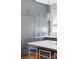 Modern kitchen features built-in refrigerator, ample cabinet space, and marble counters at 56 Parkwood Ave, Charleston, SC 29403