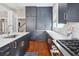 Modern kitchen with stainless appliances and granite counter tops and view to living room at 56 Parkwood Ave, Charleston, SC 29403