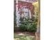 Beautifully landscaped yard with mature plantings enhancing the home's exterior at 56 Parkwood Ave, Charleston, SC 29403