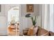 View from living room into dining area featuring stylish seating and natural light at 56 Parkwood Ave, Charleston, SC 29403