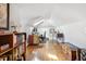 Spacious home office features skylights, hardwood floors, and organized shelving for an efficient workspace at 56 Parkwood Ave, Charleston, SC 29403