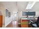 Home office with a bright skylight over a desk, hardwood flooring, and stylish accents at 56 Parkwood Ave, Charleston, SC 29403