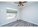 Bright bedroom featuring natural light, hardwood floors, and a ceiling fan at 566 Four Seasons Blvd, Summerville, SC 29486