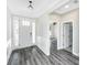 Beautiful entryway with hardwood floors and a view of the living room at 566 Four Seasons Blvd, Summerville, SC 29486