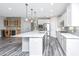 Bright kitchen with modern appliances, stylish countertops, and an inviting breakfast bar at 566 Four Seasons Blvd, Summerville, SC 29486