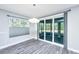 Bright living room with sliding glass doors and a window at 566 Four Seasons Blvd, Summerville, SC 29486