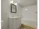 Bathroom featuring a vanity with ample storage space and a shower-tub combo at 5729 Edison Ave, Hanahan, SC 29410