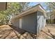 Home with backyard area, trees, and storage building at 5729 Edison Ave, Hanahan, SC 29410