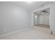 Open-concept room featuring tile floors and gray flooring, with neutral walls at 5729 Edison Ave, Hanahan, SC 29410