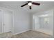 Lovely room features gray floors, a fan, and a neutral color palette at 5729 Edison Ave, Hanahan, SC 29410