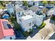 Aerial view of modern homes with rooftop terraces and gardens in a vibrant neighborhood at 7 Fields Pl, Charleston, SC 29403