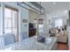 Spacious living room and kitchen featuring granite countertops, hardwood floors, and neutral tones at 7 Fields Pl, Charleston, SC 29403