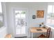 Cozy office with lots of natural light, a desk, chair, and art at 7 Fields Pl, Charleston, SC 29403