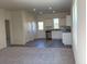 Open floor plan with the kitchen featuring white cabinets, granite countertops, and stainless steel appliances at 719 Pisces Ln, Summerville, SC 29486