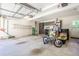 Clean garage with organized storage cabinets and room for vehicle parking and other recreational items at 772 Preservation Pl, Mount Pleasant, SC 29464