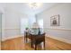 Charming home office featuring hardwood floors, natural light, and stylish decor at 772 Preservation Pl, Mount Pleasant, SC 29464