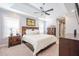 Spacious main bedroom with tray ceiling, fan, large windows, and ensuite at 772 Preservation Pl, Mount Pleasant, SC 29464
