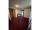 Bedroom features striped curtains, an exercise machine, and closet with louvered doors at 7819 Bells Hwy, Ruffin, SC 29475