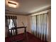 Cozy bedroom with striped curtains, and patterned wallpaper at 7819 Bells Hwy, Ruffin, SC 29475