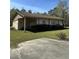 Side view of a single story house with a yard and driveway at 7819 Bells Hwy, Ruffin, SC 29475