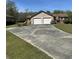 Detached two-car garage with a large driveway and green lawn at 7819 Bells Hwy, Ruffin, SC 29475