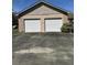 Close-up of a detached two-car garage with a large driveway at 7819 Bells Hwy, Ruffin, SC 29475