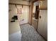 Practical hallway with a doorway providing access to other rooms and utilities at 7819 Bells Hwy, Ruffin, SC 29475