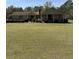 Beautiful brick home exterior with a well-manicured front lawn at 7819 Bells Hwy, Ruffin, SC 29475