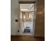 Bright sunroom with skylight, tile flooring, and wood paneled walls at 7819 Bells Hwy, Ruffin, SC 29475