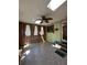Spacious sunroom with fan, skylight, and tiled floor at 7819 Bells Hwy, Ruffin, SC 29475