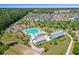 Aerial view of the neighborhood featuring a community pool, barn, and meticulously planned homes and landscaping at 804 Buckler St, Summerville, SC 29486