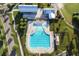 Aerial view of a community pool, barn, and homes, showcasing the community amenities and layout at 804 Buckler St, Summerville, SC 29486