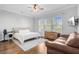 Bright bedroom with a ceiling fan, natural light, and hardwood floors at 804 Buckler St, Summerville, SC 29486