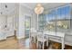 Cozy breakfast nook with bright natural light, chandelier, and views of the backyard at 804 Buckler St, Summerville, SC 29486