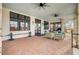 Inviting clubhouse porch with brick pavers, ceiling fans, and comfortable seating area at 804 Buckler St, Summerville, SC 29486