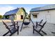 Cozy fire pit area with comfortable Adirondack chairs, perfect for outdoor gatherings at 804 Buckler St, Summerville, SC 29486