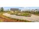 Community garden featuring gravel pathways, raised garden beds, and lush plantings at 804 Buckler St, Summerville, SC 29486