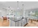 Bright, open kitchen boasts stainless steel appliances, eat-in kitchen, and seamless flow to the living area at 804 Buckler St, Summerville, SC 29486