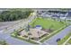 Neighborhood playground with slides, climbing structures, and shade, surrounded by homes and green space at 804 Buckler St, Summerville, SC 29486