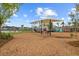 Community playground with shaded play equipment, benches, and views of the neighborhood at 804 Buckler St, Summerville, SC 29486