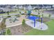 Aerial view of a neighborhood playground featuring play equipment, a picnic shelter, and surrounding homes at 804 Buckler St, Summerville, SC 29486