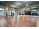 Versatile studio with hardwood floors, mirrored wall and racks for equipment storage at 804 Buckler St, Summerville, SC 29486