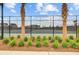 Outdoor tennis court featuring well-maintained landscaping and a secure fence, perfect for recreational enjoyment at 804 Buckler St, Summerville, SC 29486