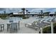 Resort-style community pool with ample seating and palm trees, perfect for relaxation and recreation at 820 Gentle Breeze Dr, Summerville, SC 29486