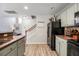 Charming kitchen featuring granite countertops, stainless steel appliances, and hardwood flooring at 8842 Gable St, North Charleston, SC 29406