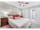 Spacious main bedroom featuring a ceiling fan, comfortable furnishings, and soft lighting at 8842 Gable St, North Charleston, SC 29406