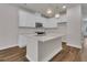 Bright kitchen showcasing a large island, stainless steel appliances, recessed lighting and ample counter space at 960 Dusk Dr, Summerville, SC 29486