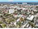 A stunning aerial view of a neighborhood with waterfront views of the Ravenel Bridge and Ashley River at 99 Logan St, Charleston, SC 29401