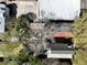 Aerial view of the building's roof and surroundings, highlighting mature trees and neighborhood architecture at 99 Logan St, Charleston, SC 29401